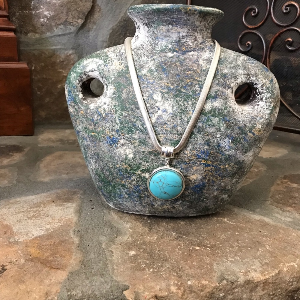 Silver chain with Turquoise stone.